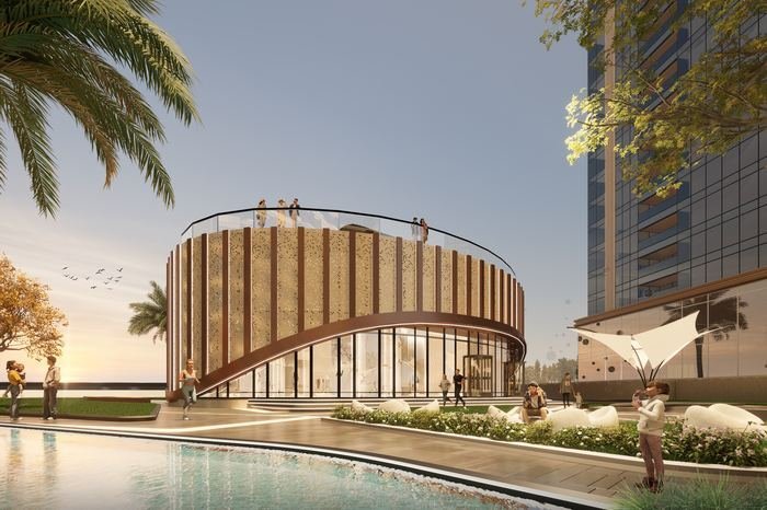 Podium-level clubhouse pavilion and water body at Trump Towers Hyderabad, Kokapet, at sunset
